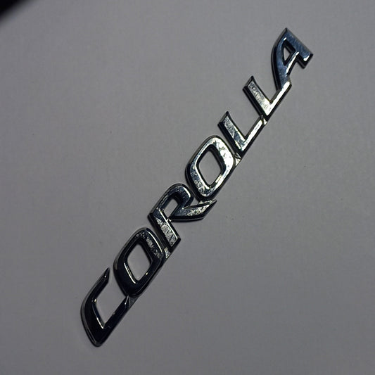 Emblema Letra Corolla