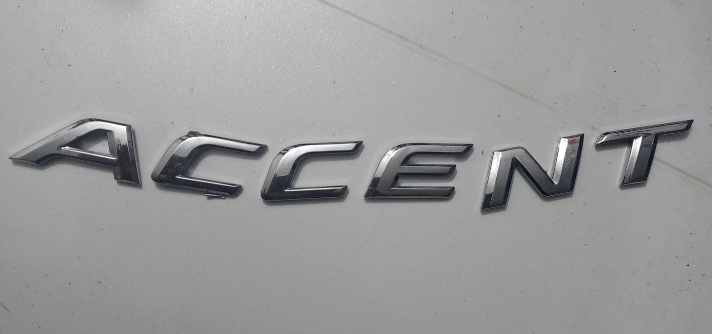 Emblema Letra Accent