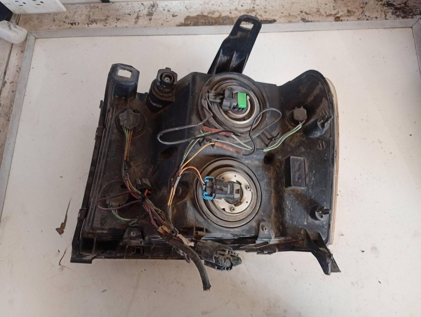 Faro Delantero GMC Sierra 2006 2008