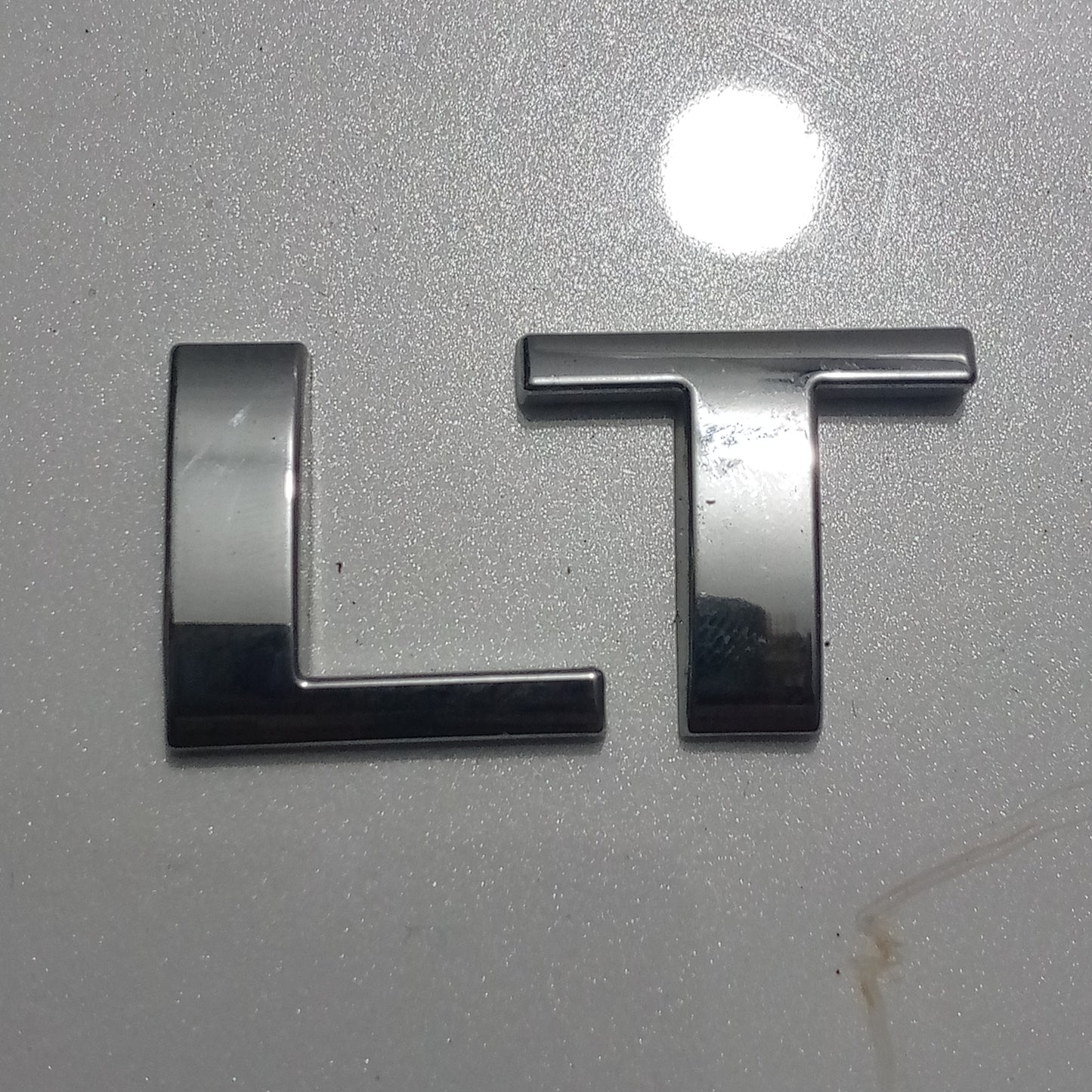 Emblema LT Aveo Chevrolet