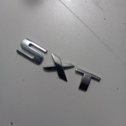 Emblema SXT Compuerta Trasera Dodge Caliber