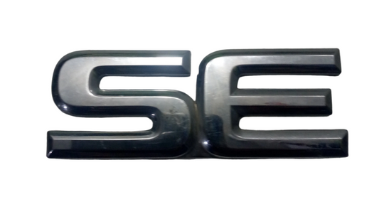 Emblema SE Puerta Trasera Nissan Pathfinder 1999 2001